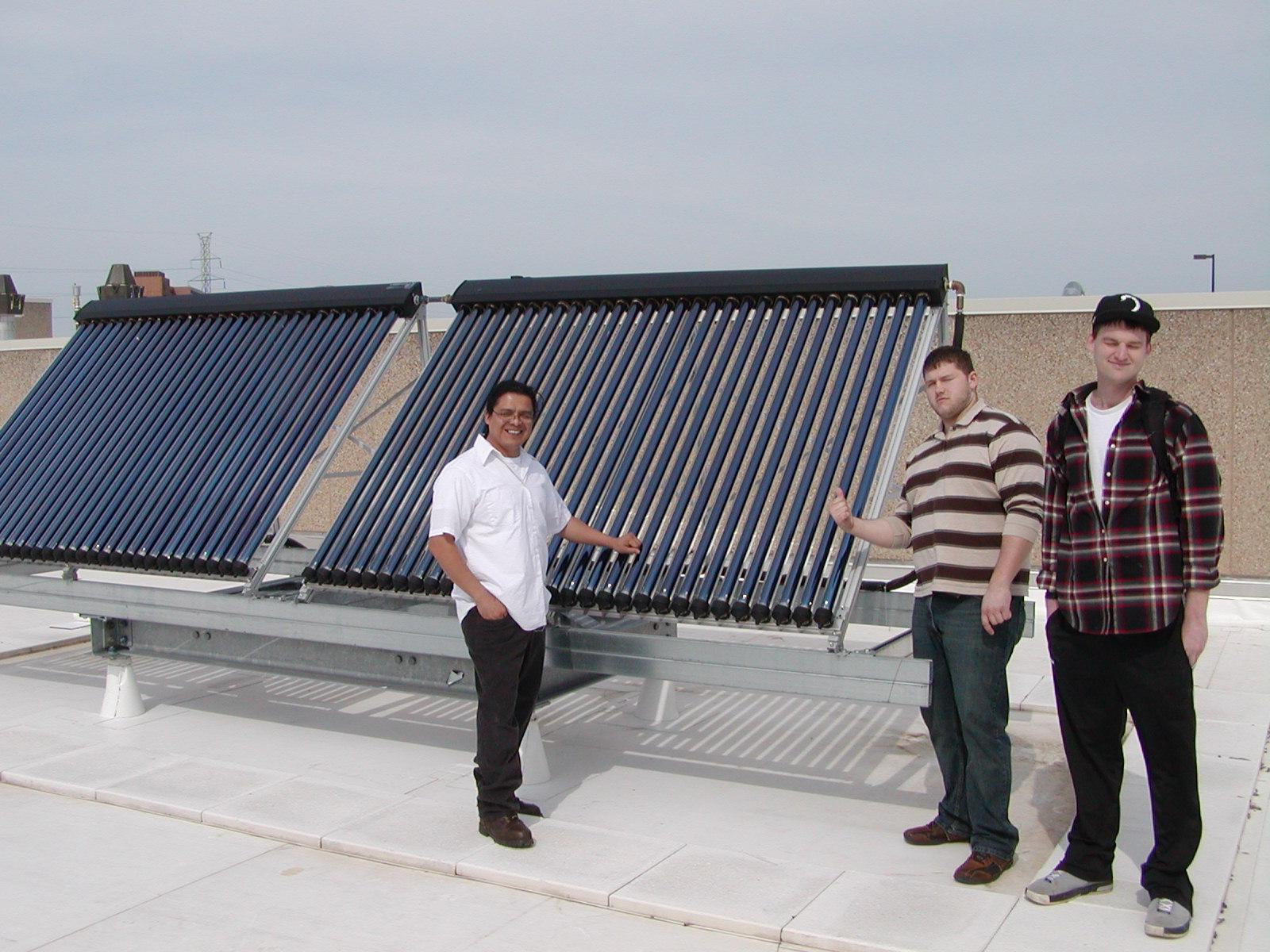 Students with solar hot water panels.